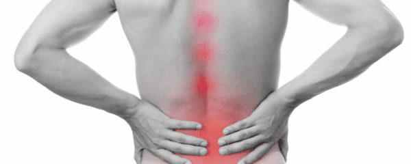 Bare torso with hands on the lower back, with the spine and lower back highlighted in red to indicate pain.